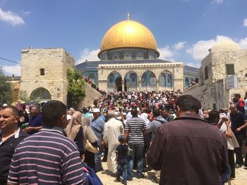 Group of people in front of building