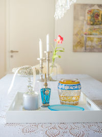 Close-up of containers on table at home