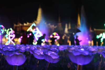 Close-up of illuminated lights at night