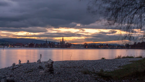 Scenic view of city at sunset
