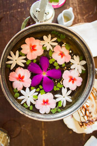 High angle view of flowers in plate on table