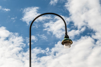 Low angle view of street light against sky