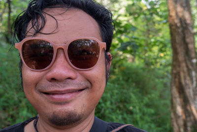 Portrait of young man wearing sunglasses