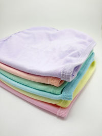 Close-up of multi colored pencils on white background