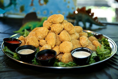 Close-up of served food in plate