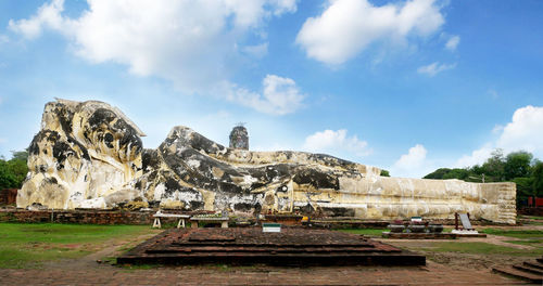 Old ruin building against cloudy sky