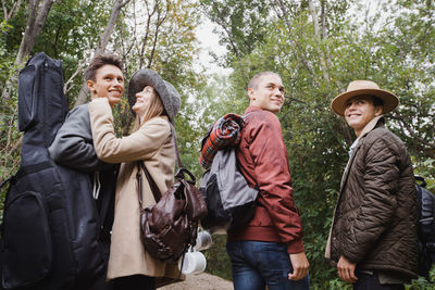 Group of people against trees