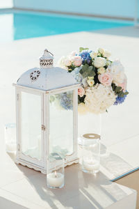 Close-up of white flower vase on table