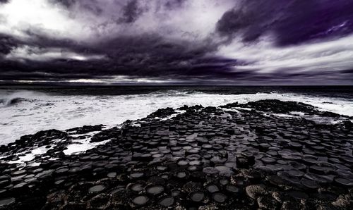 Scenic view of sea shore against sky