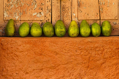 Lined mangos placed in a window ii , trinidad - cuba