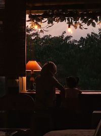 Rear view of people sitting in restaurant