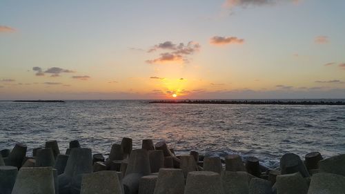 Scenic view of sea against sky during sunset