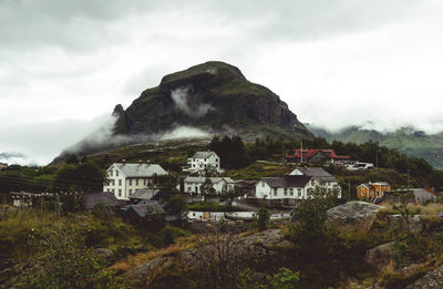 Scenic view of residential buildings against sky