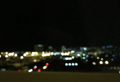 Defocused lights on road at night