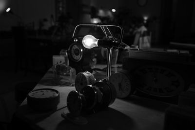 Close-up of electric lamp on table