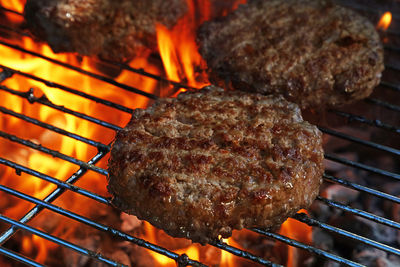 Close-up of meat on barbecue grill