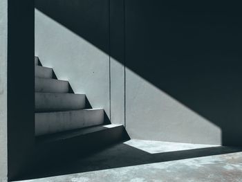 Sunlight falling on staircase in building