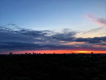 Scenic view of silhouette landscape against sky during sunset