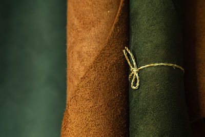 Close-up of rolled up leather