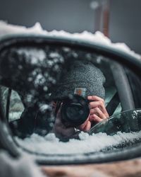 Person photographing with ice cream