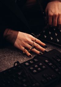 High angle view of woman hand using mobile phone
