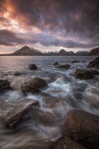 Scenic view of dramatic sky over sea