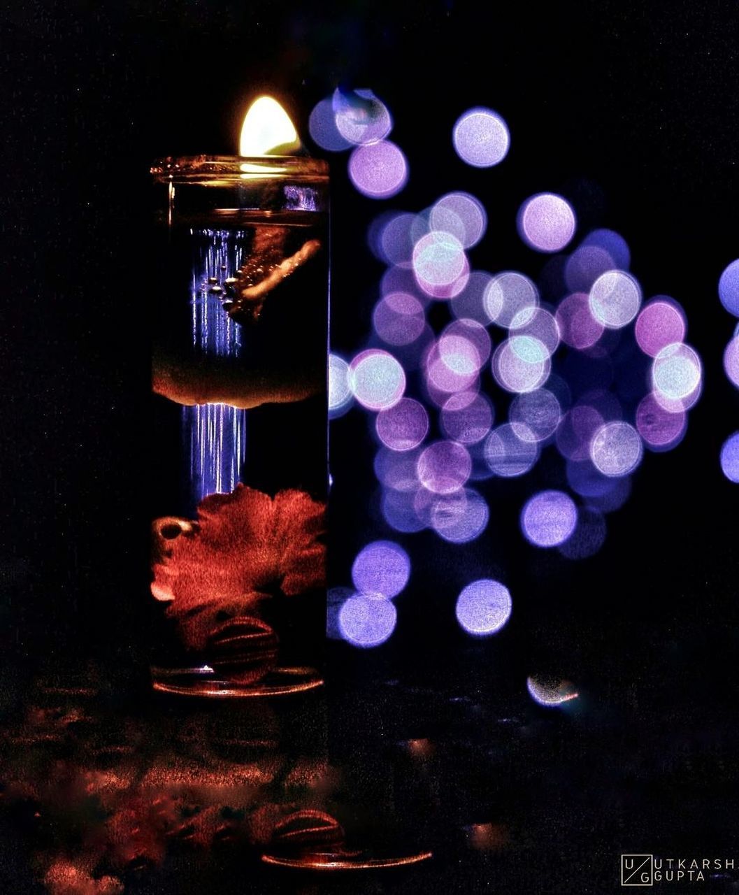 CLOSE-UP OF ILLUMINATED LAMP