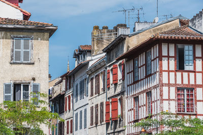 Low angle view of residential buildings against sky