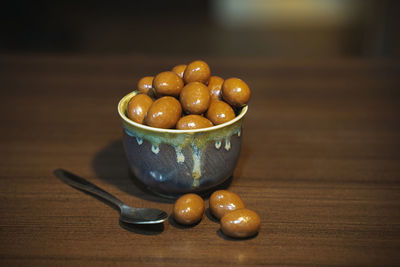 Close-up of fruits in bowl on table