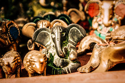 Close-up of souvenirs for sale in market