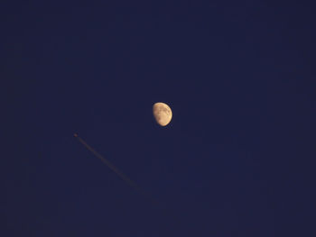 Low angle view of moon in sky