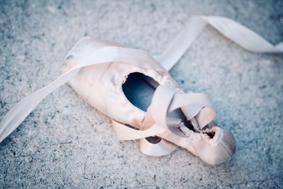 High angle view of ballet shoe on floor