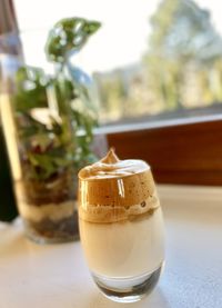 Close-up of coffee in glass on table