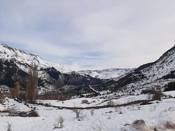 Snow covered mountain against sky