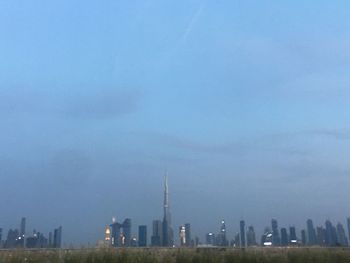 View of buildings against cloudy sky