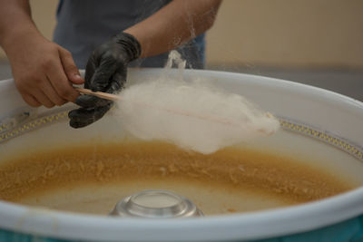 Close-up of person preparing food