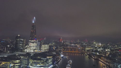 Illuminated buildings in city at night