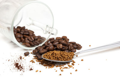 Close-up of coffee beans on table