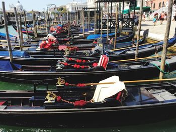 Boats moored at harbor