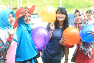 Group of people in balloons