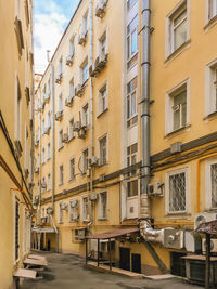 Narrow yard between apartment buildings. old houses in in moscow, russia.