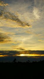 Scenic view of dramatic sky during sunset