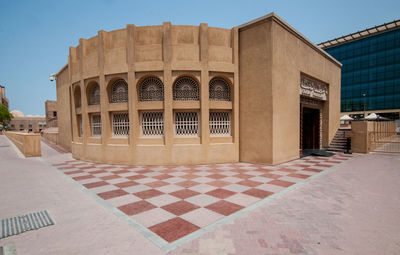 Exterior of heritage building against clear sky