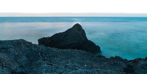 Scenic view of sea against clear sky