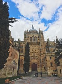 Low angle view of salamanca cathedral against sky