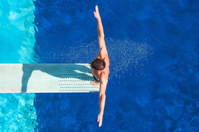 Woman swimming in pool