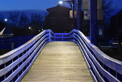 Empty staircase of building at night