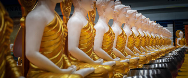 Close-up of buddha statue in temple