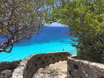 Scenic view of sea against blue sky