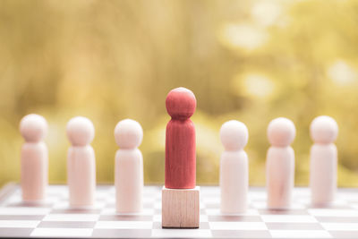 Close-up of chess pieces on table